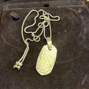 Kendra Scott gold necklace with pendant